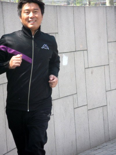满文军形象一直很正面很阳光